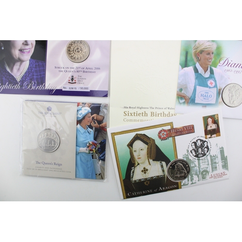 94 - A collection of carded coins to include 3 £5 Queen's Reign Royal Mint coins, Diana 1 Crown coin, Cat... 