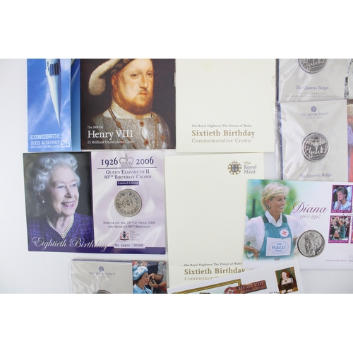 94 - A collection of carded coins to include 3 £5 Queen's Reign Royal Mint coins, Diana 1 Crown coin, Cat... 