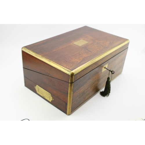 976 - A quality c19th Victorian military style mahogany rosewood & brass edged writing box opening to a sl... 