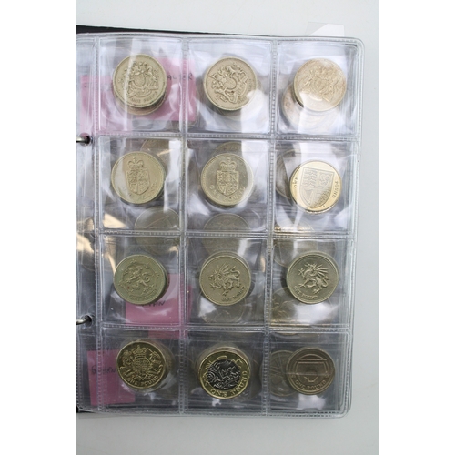 98 - A collection of 65 old £1 coins, with varying patterns, with a collection of 20p pieces also x 19.