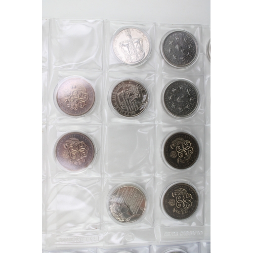 99 - A collection of cupro-nickel coins to include a quantity of £5 coins, half crowns, five shillings co... 