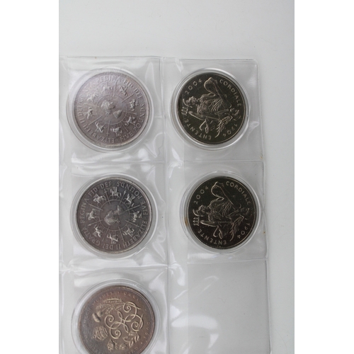 99 - A collection of cupro-nickel coins to include a quantity of £5 coins, half crowns, five shillings co... 