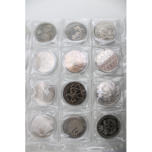 99 - A collection of cupro-nickel coins to include a quantity of £5 coins, half crowns, five shillings co... 