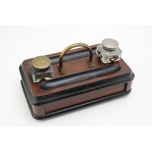 187 - An antique desk inkwell set with drawer, width 25cm.