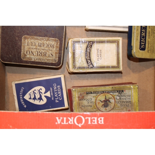 196 - A colection of advertising playing cards including James Buchanan Whisky, king orray tobacco box wit... 