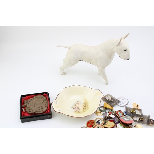 197 - A collection of Bull Terrier Club related items including a large quanitity of enamel,, metal and ti... 