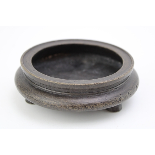 1153 - Chinese bronze three-footed censor, Qing Period, 11cm diameter.