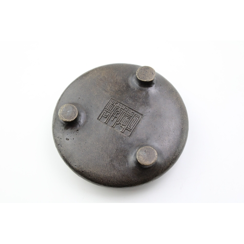 1153 - Chinese bronze three-footed censor, Qing Period, 11cm diameter.