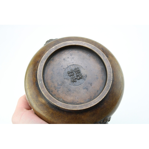 1154 - Chinese bronze Qianlong signed censor, Foo Dog Terminal, 17cm diameter.