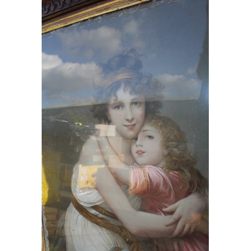 1165 - Oak framed Edwardian print of a mother and child, 75cm  x 60cm inc frames.