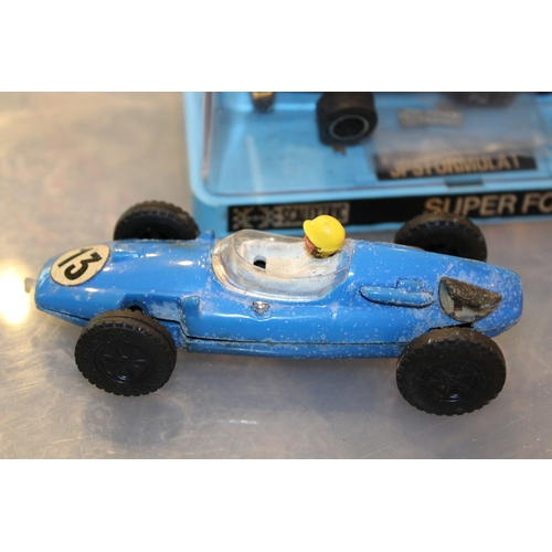 1172 - Scalectric Super Formula 1 C.050 John Player Special together with another vintage Tri-ang Scalextri... 