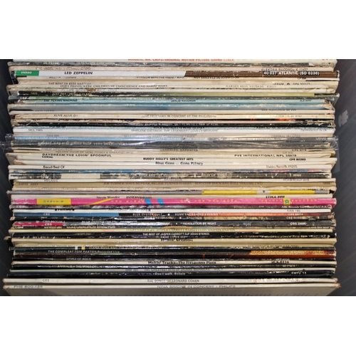 1173 - Large box of LP's including artists such as Nina Simone, Leonard Cohen, Blue Oyster Cult and many mo... 