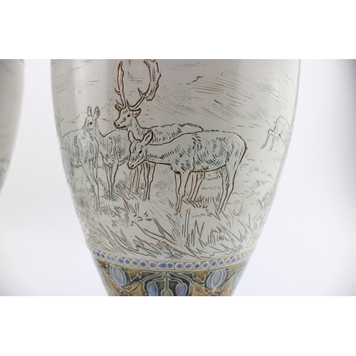 196 - A pair of large Doulton Lambeth baluster vases, by Hannah Barlow, circa 1909, sgrafitto with deers a... 