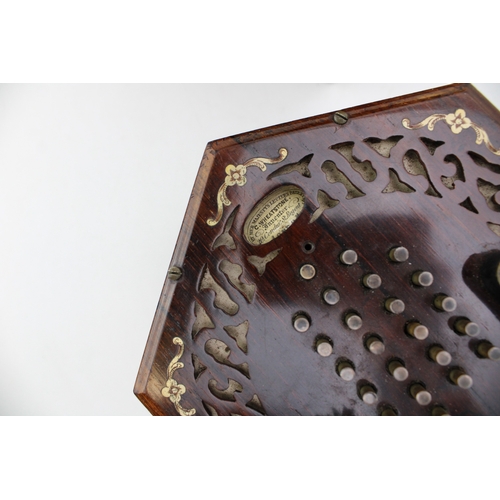 67 - C WHEATSTONE & CO. 48 button, late 19th No. 6720, manufacturers label to 'Her Majesty' century forty... 