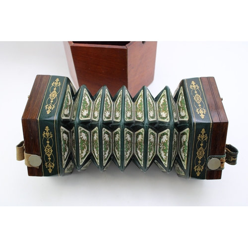 67 - C WHEATSTONE & CO. 48 button, late 19th No. 6720, manufacturers label to 'Her Majesty' century forty... 