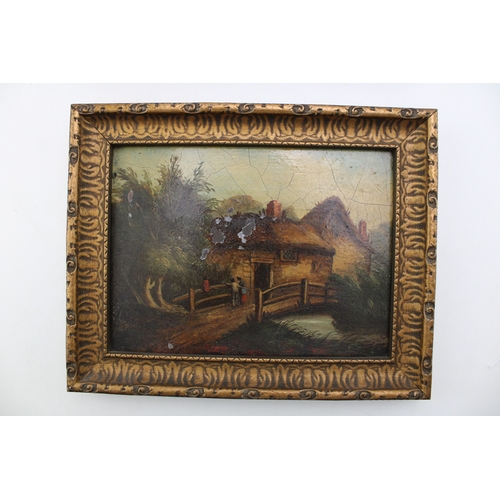 95 - A pair of oils on wooden panel of country house scenes, one of a thatched barn with church in rear, ... 