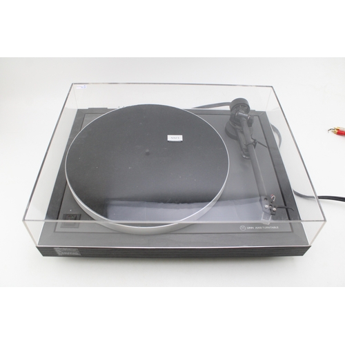 Linn Axis Turntable with dust cover and original instruction manual.