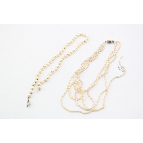 4 - A string of vintage cultured pearls, knotted with silver clasp, a/f string broken, and a four strand... 