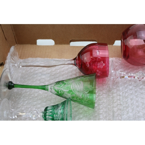 11 - A mixed collection of antique lead glass glasses together with a cranberry glass pitcher and vintage... 