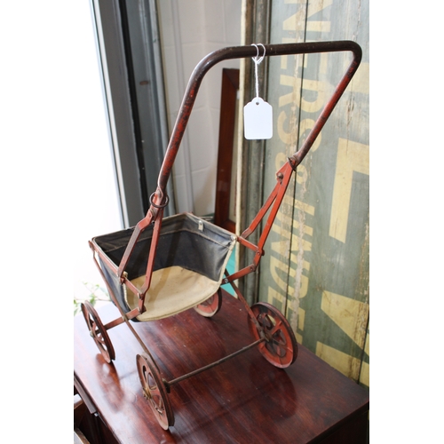 12 - Child's baby doll pram in pressed steel with folding frame, c1930s, 63cm tall.