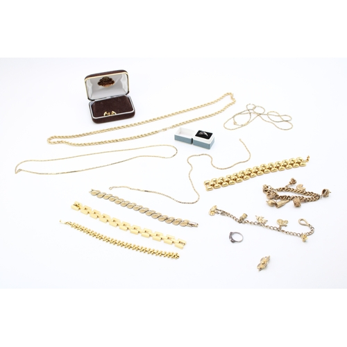 123 - A collection of vintage gold plated costume jewellery to include Christian Dior items and silver rin... 