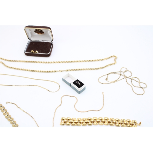 123 - A collection of vintage gold plated costume jewellery to include Christian Dior items and silver rin... 