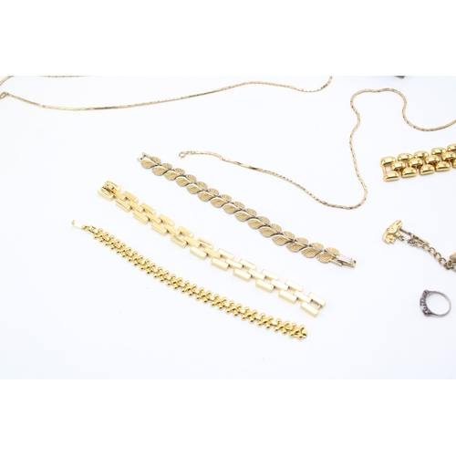 123 - A collection of vintage gold plated costume jewellery to include Christian Dior items and silver rin... 