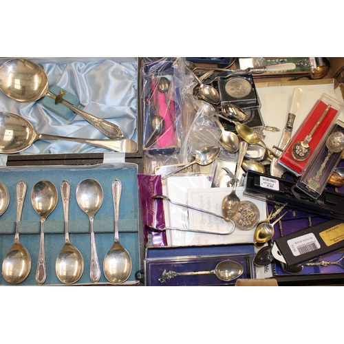 132 - A mixed collection of silver plated spoons to include some silver examples and UK coinage together w... 