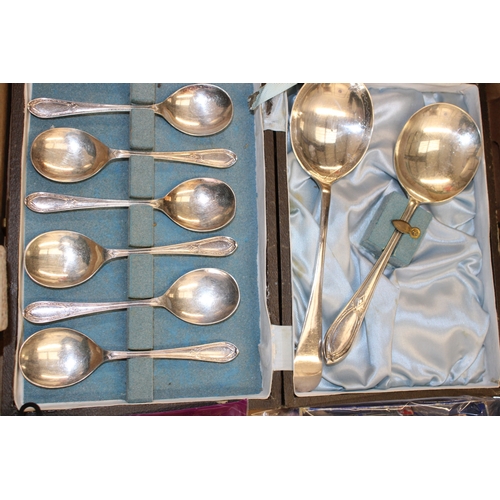 132 - A mixed collection of silver plated spoons to include some silver examples and UK coinage together w... 