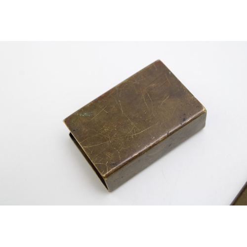139 - WWI brass trench art style matchbox holder together with a trench art lighter, 6cm tall, (2).