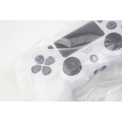 14 - Boxed Playstation 4, Glacier White, 500GB, one controller, vendor states to have factory reset and s... 