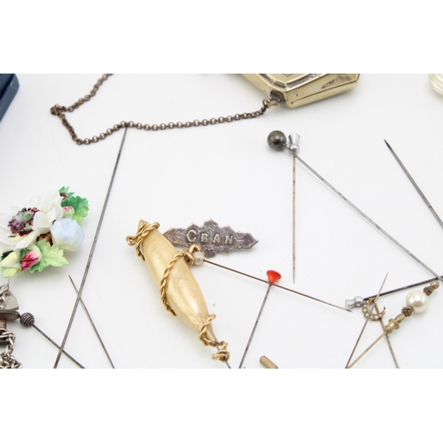 142 - A mixed collection of vintage costume jewellery items, silver plated purse, together with a silver b... 