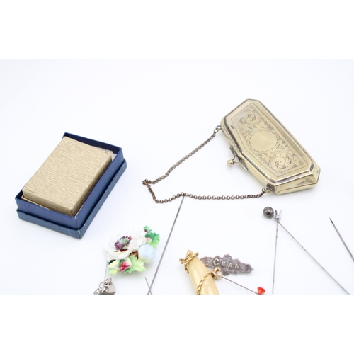 142 - A mixed collection of vintage costume jewellery items, silver plated purse, together with a silver b... 