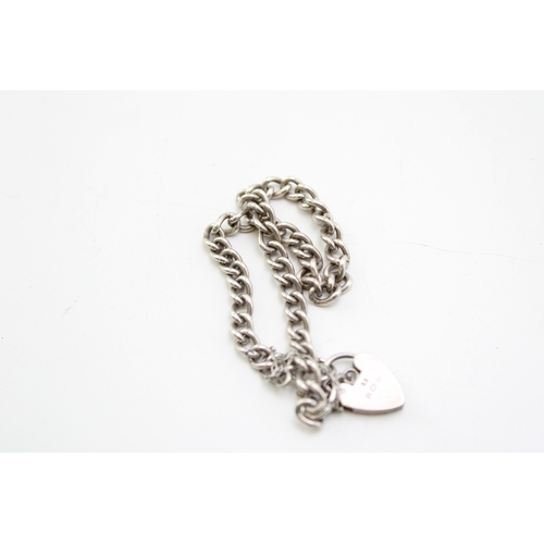 142 - A mixed collection of vintage costume jewellery items, silver plated purse, together with a silver b... 