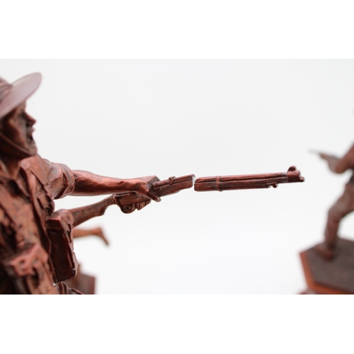 144 - Three Danbury Mint World War Two figures to include the Liberator and others (3), with coins inset t... 