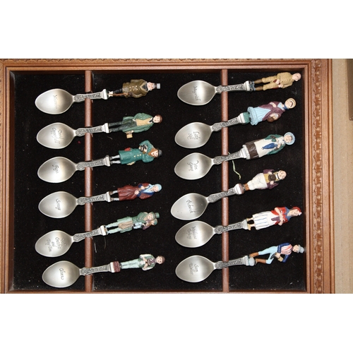 16 - The Charles Dickens pewter spoons set by Franklin mint complete with display case.