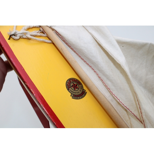 164 - Star Yacht, Birkenhead, pond yacht in yellow and red colour-way, 36cm wide, 47cm tall.