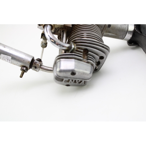 167 - Enya 60-4c Fourstroke enginne for model aircraft, together with one other, 23cm wide, 13cm tall, (2)... 