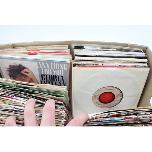 169 - a collection of vinyl 7 inch records from the 1960s, 1970, 1980s and 1990s