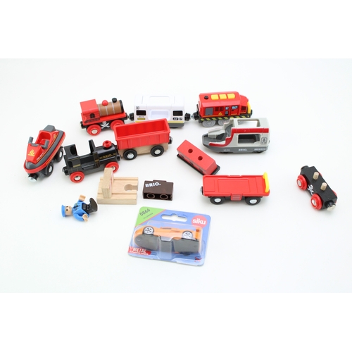 20 - A mixed collection of Brio Toys model railways to include battery operated engine and other similar ... 