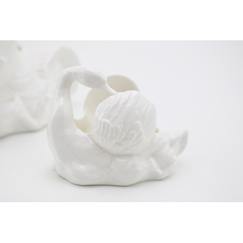 29 - Crown Staffordshire ceramic swan together with another smaller example, 13cm tall, (2).