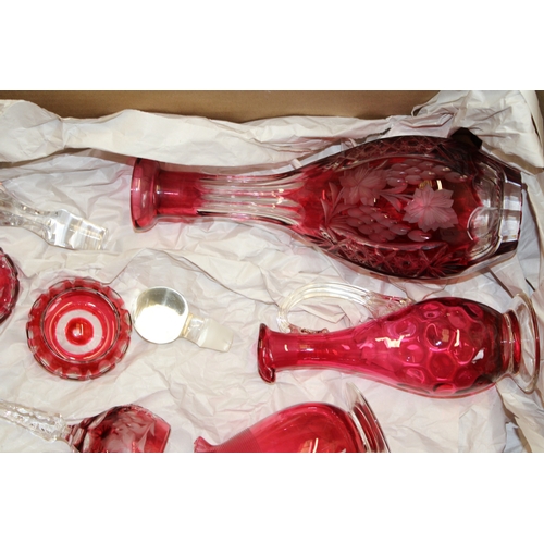 31 - A collection of cranberry glass to include bon bon dishes, glasses and other similar items, (Qty).