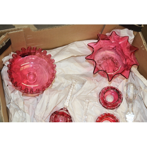 31 - A collection of cranberry glass to include bon bon dishes, glasses and other similar items, (Qty).