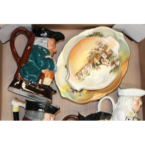 32 - A collection of Royal Doulton items to include Series Ware bowls, character jugs 