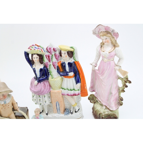33 - A collection of continental and Staffordshire ceramics to include a pair of miniature figures, other... 