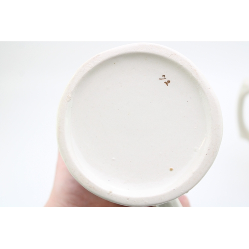 47 - A set of three Victorian Staffordshire pottery graduated water jugs