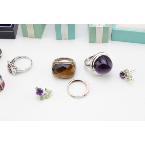 51 - A collection of costume jewellery and silver dress rings to include gold on silver examples, (Qty).