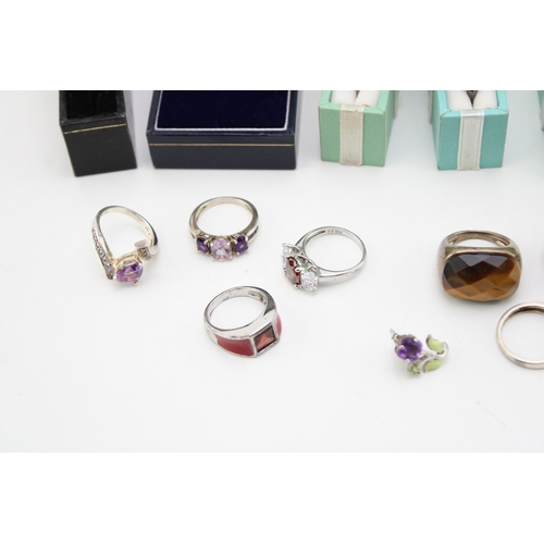 51 - A collection of costume jewellery and silver dress rings to include gold on silver examples, (Qty).