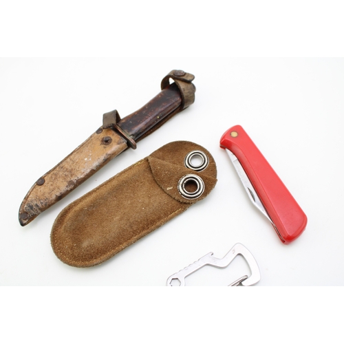 53 - Leatherman clip on multitool together with Leatherman leather sheath for Wingman or similar tool tog... 