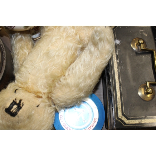 58 - A mixed collection of items to include a Merrythought teddy bear, Smiths mantle clock and other simi... 